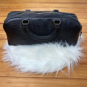 Antique Schell black leather bag